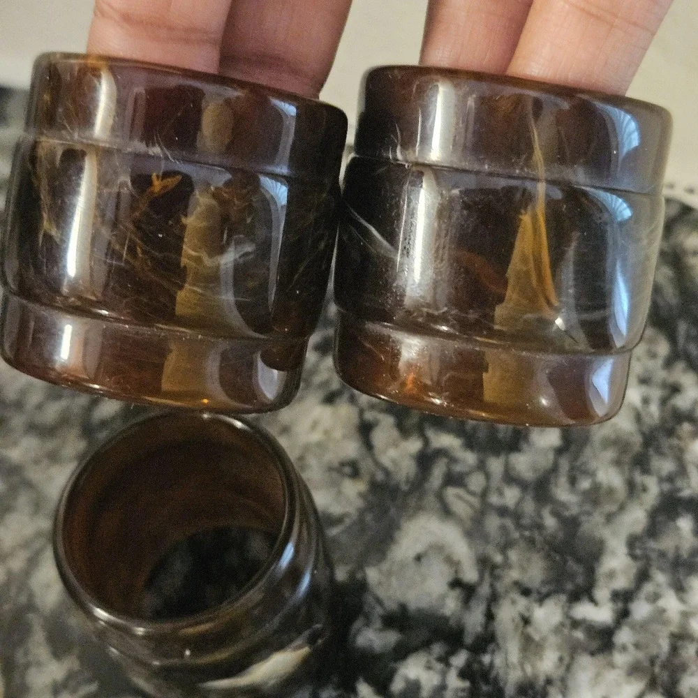 Set of 3 brown swirl like tortoise‎ plastics or bakelite MCM napkin rings
